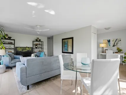 a living room with furniture and a table