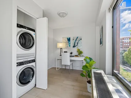 a view of a dining room with furniture and a view