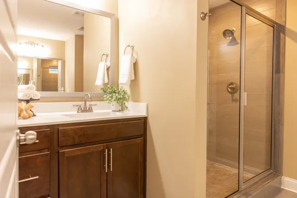 a bathroom with a sink and a mirror