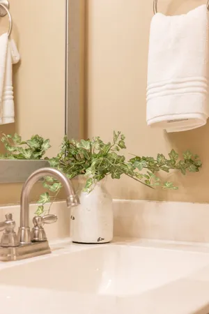 a white bath tub sitting next to a window