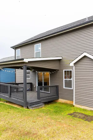 a view of a house with roof deck