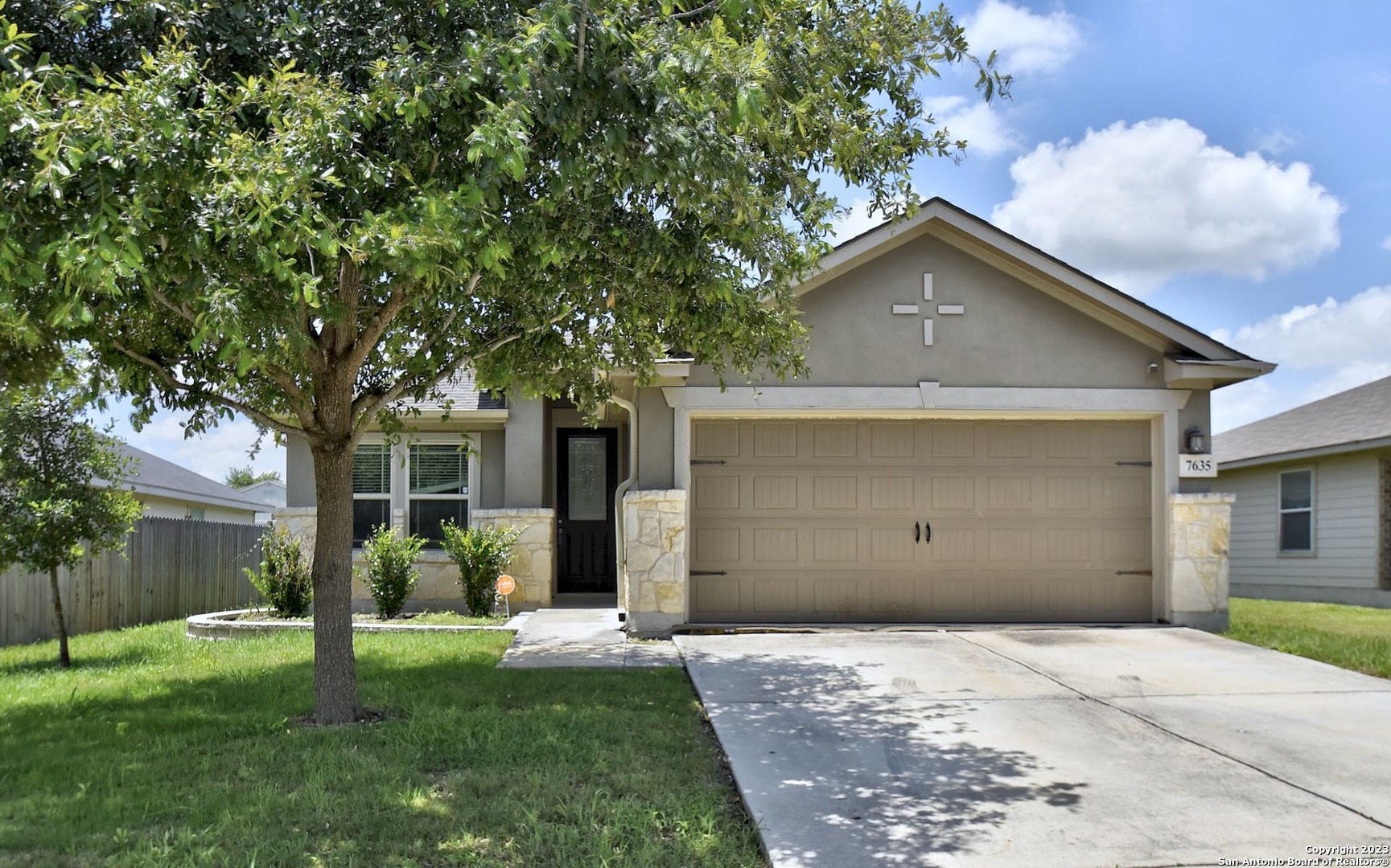 7635 Cold Mountain Converse, TX 78109 - Photo 1 of 1 a front view of a house with a yard and garage