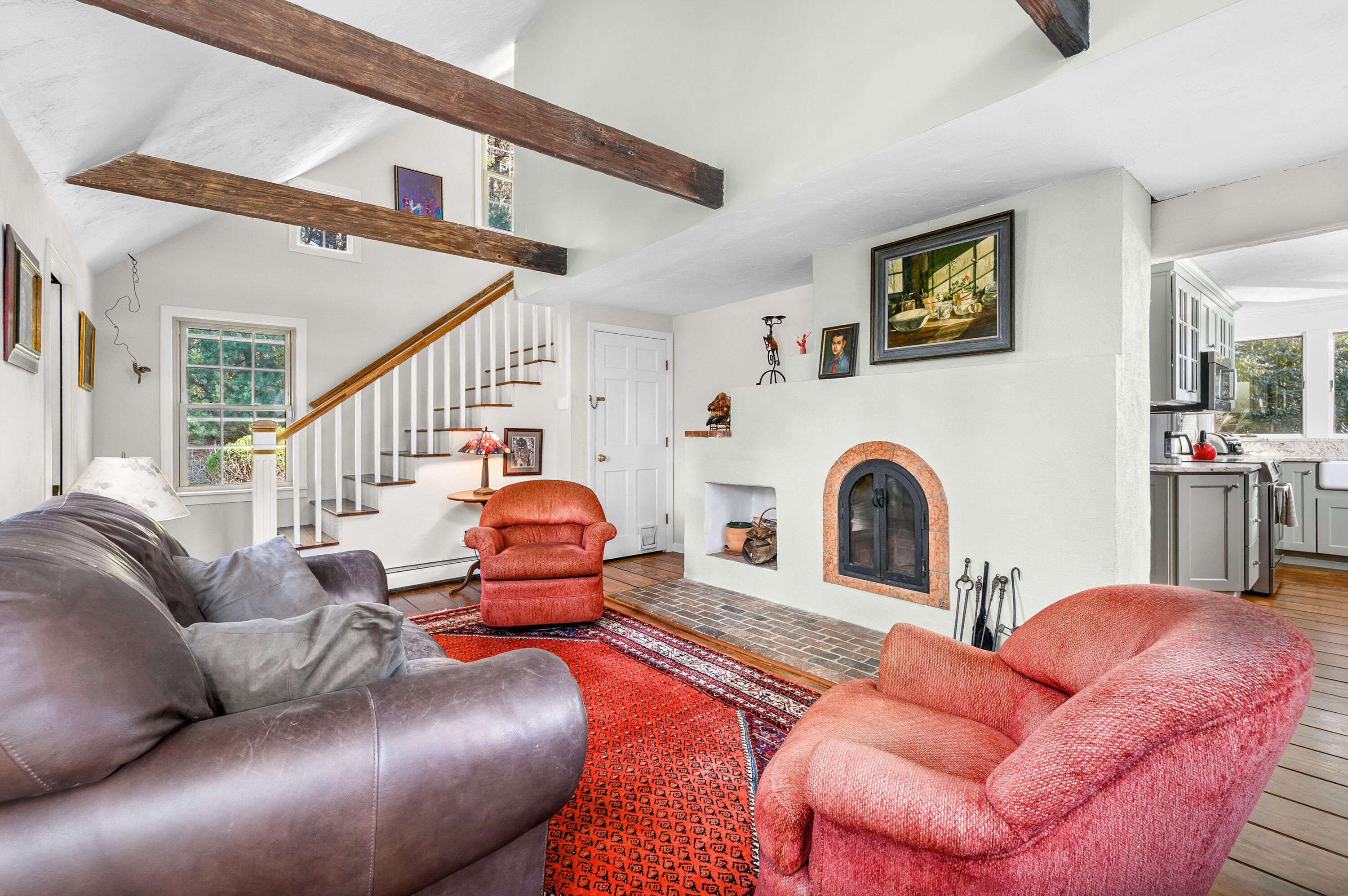 523 Bumps River Road Osterville, MA 02655 - Photo 12 of 49 a living room with furniture kitchen view and a couch