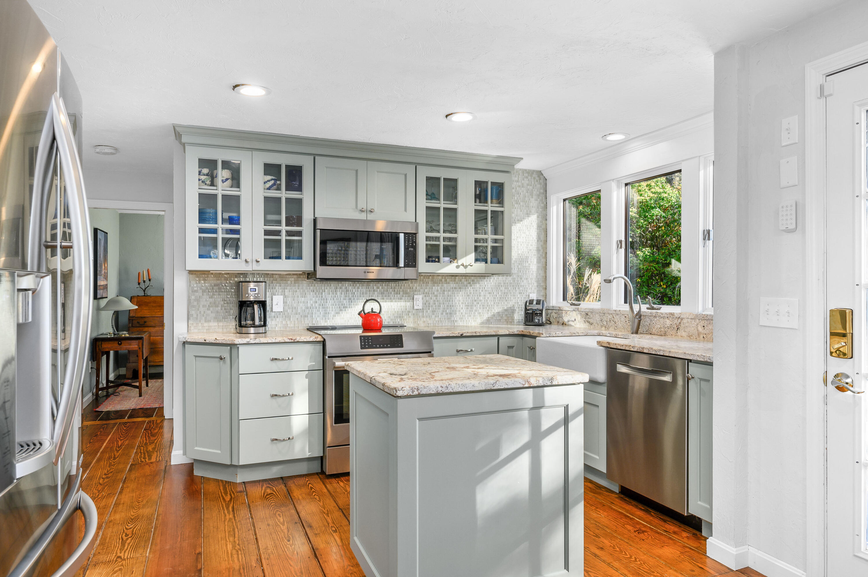 523 Bumps River Road Osterville, MA 02655 - Photo 15 of 49 a kitchen with a stove a sink and a refrigerator