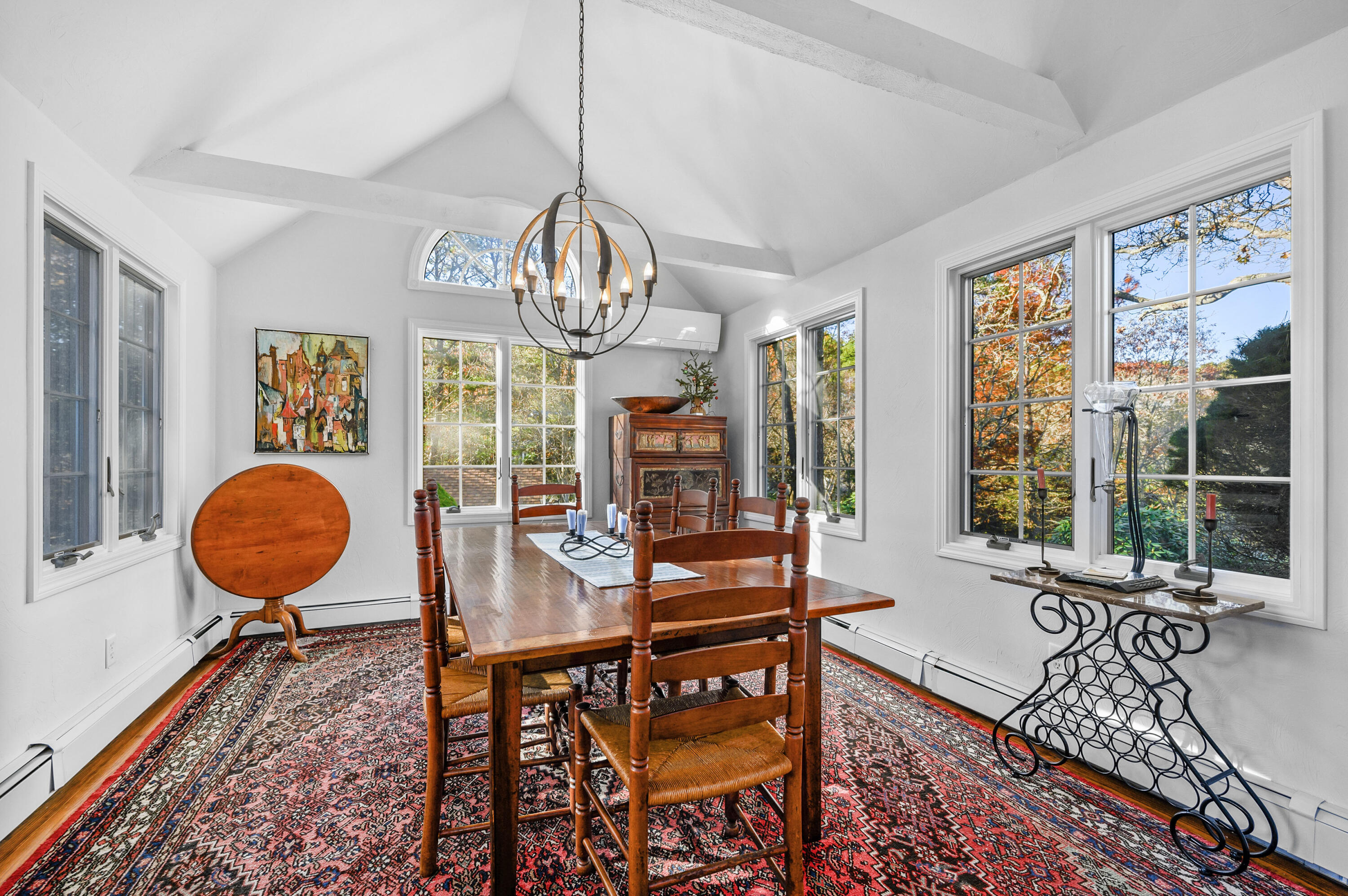 523 Bumps River Road Osterville, MA 02655 - Photo 19 of 49 a living room with furniture a chandelier and a large window