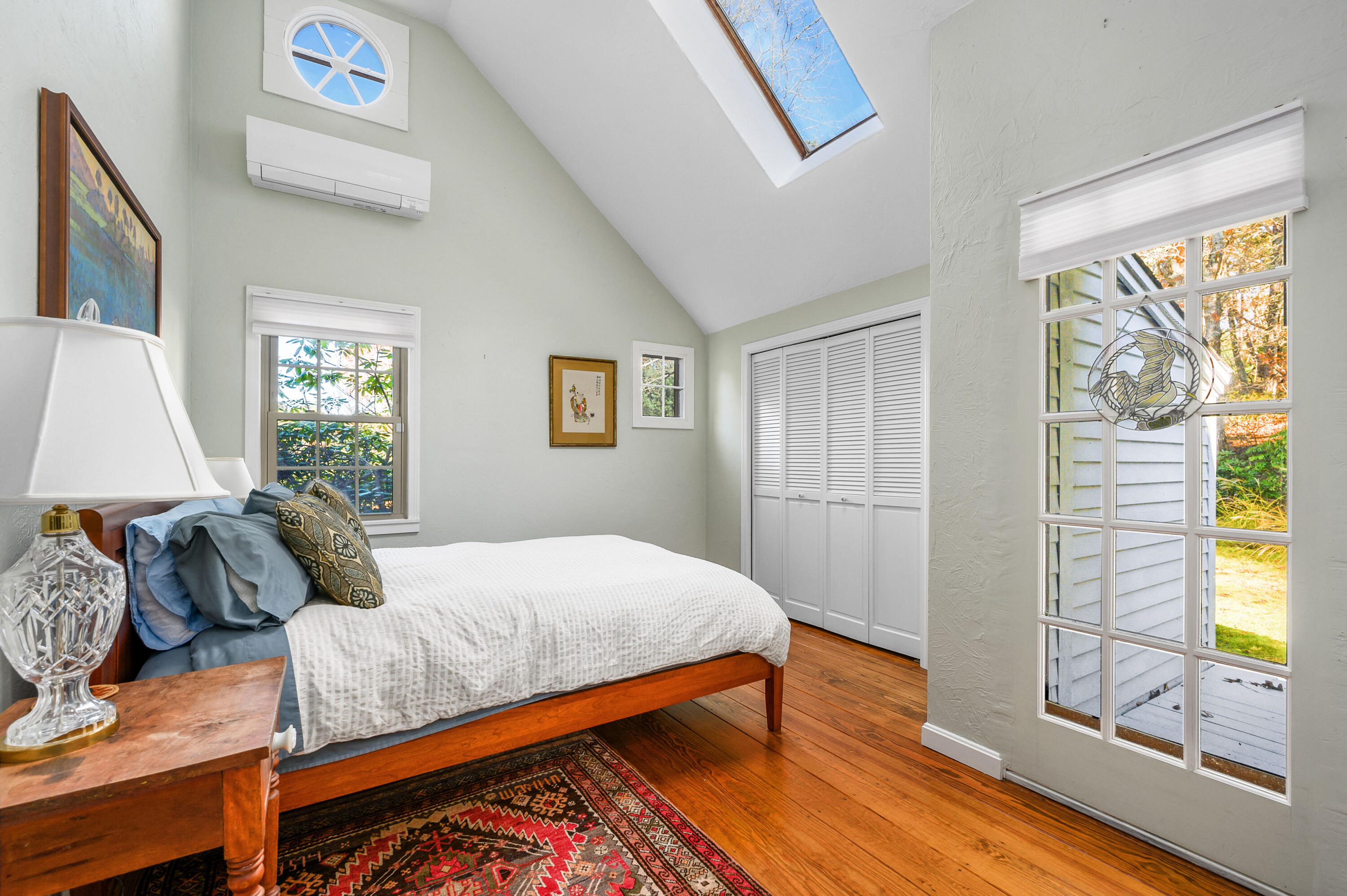 523 Bumps River Road Osterville, MA 02655 - Photo 21 of 49 a bedroom with a bed and a window