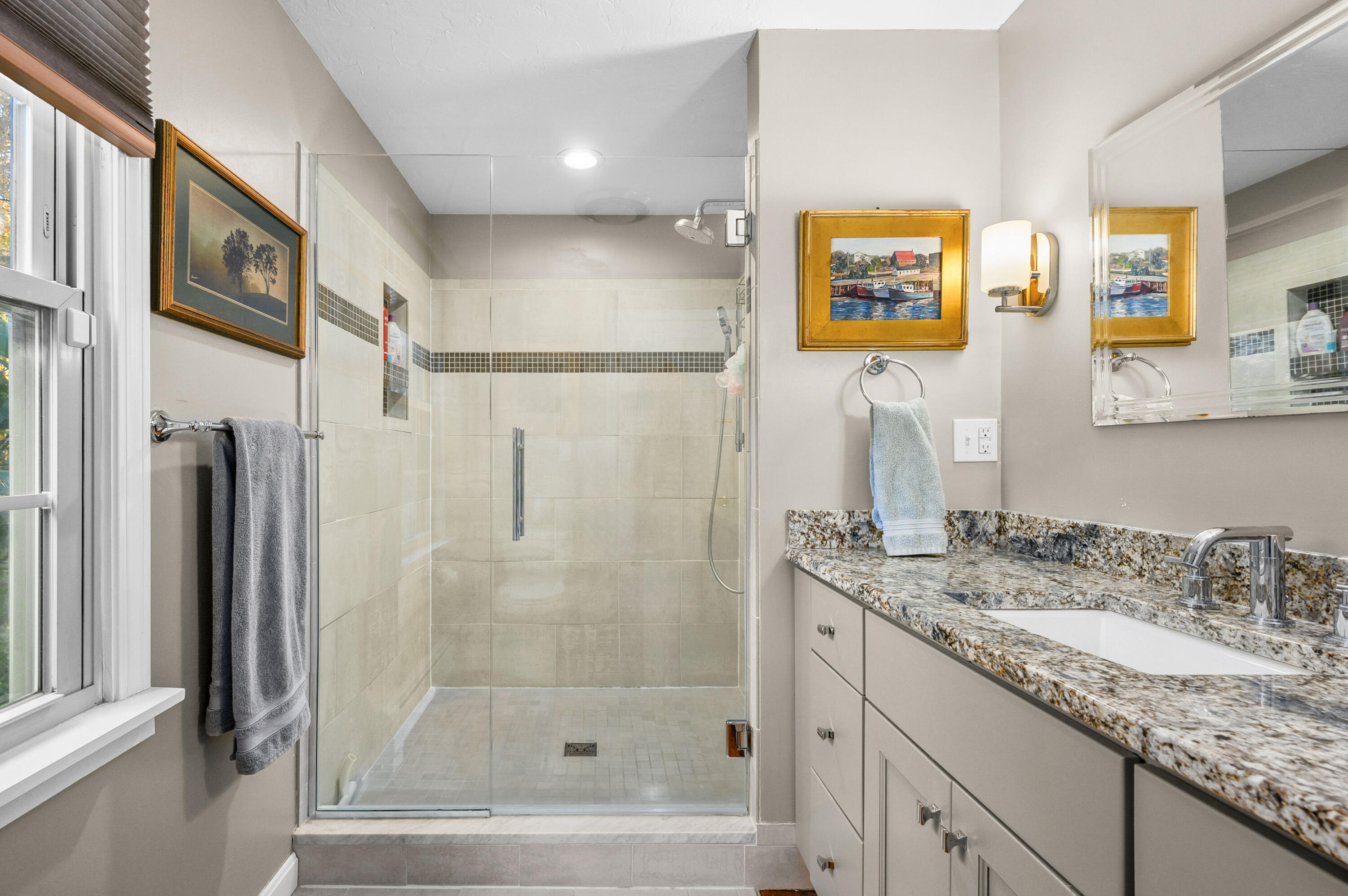 523 Bumps River Road Osterville, MA 02655 - Photo 23 of 49 a bathroom with a granite countertop shower a sink and a mirror