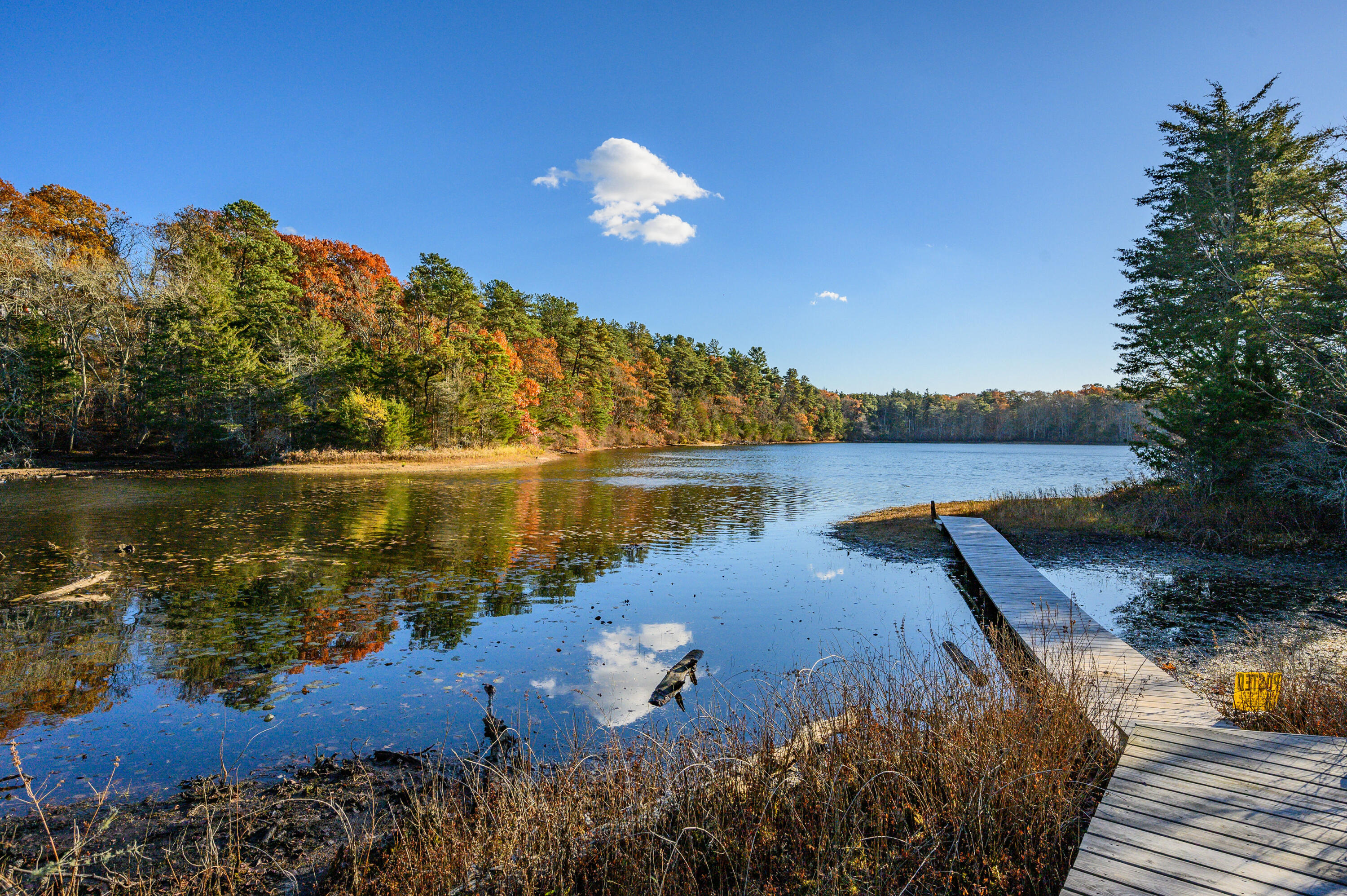 523 Bumps River Road Osterville, MA 02655 - Photo 3 of 49 a view of a lake with a mountain and a lake view
