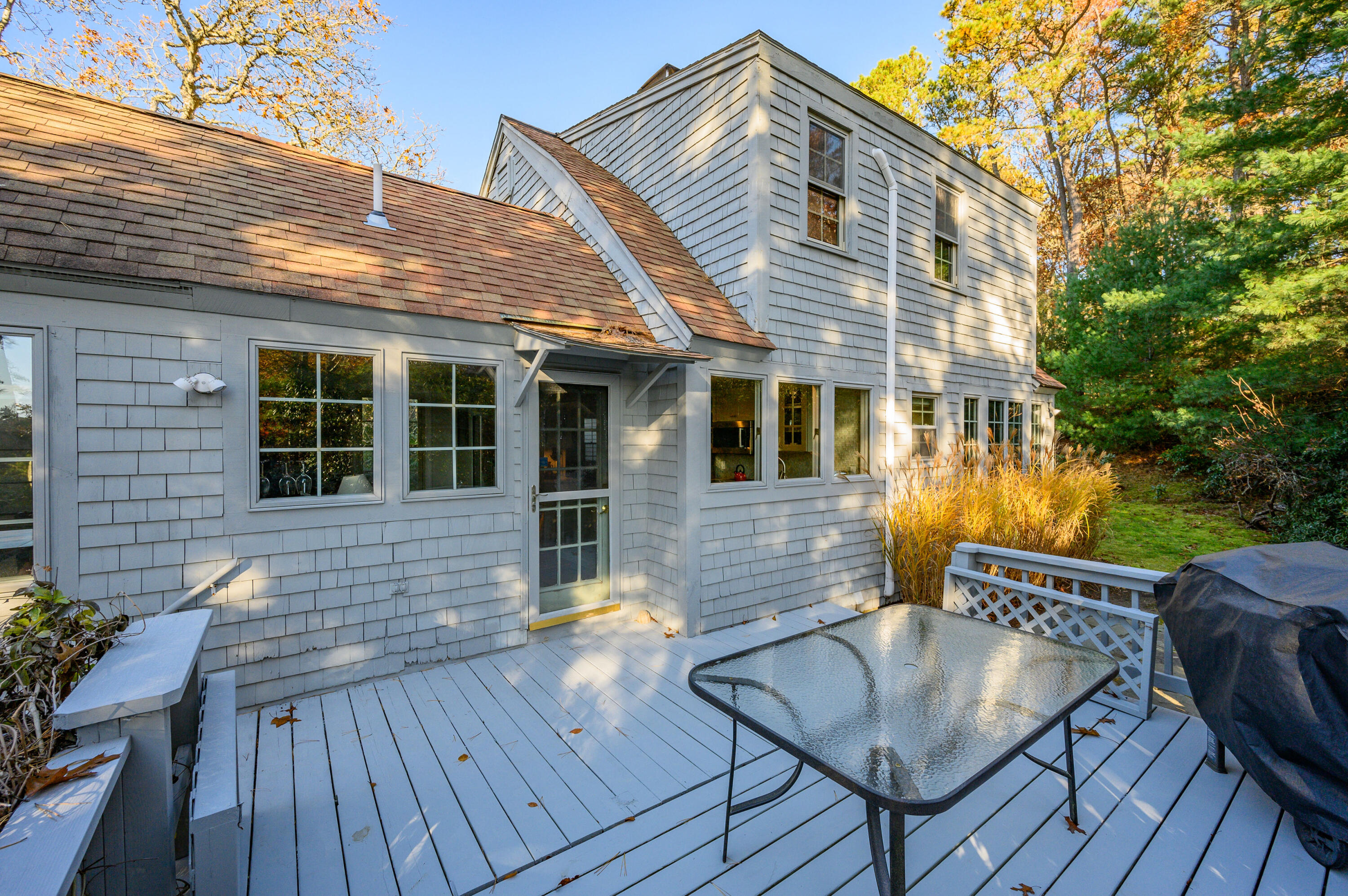 523 Bumps River Road Osterville, MA 02655 - Photo 32 of 49 a view of a house with pool and chairs