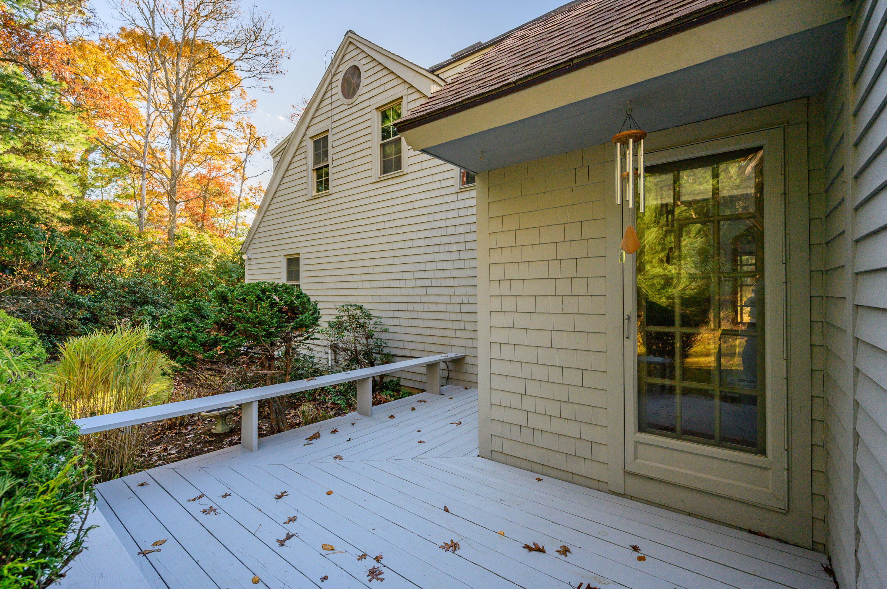 523 Bumps River Road Osterville, MA 02655 - Photo 36 of 49 a view of a balcony with wooden floor and fence