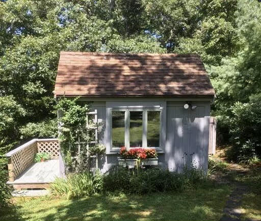523 Bumps River Road Osterville, MA 02655 - Photo 38 of 49 a view of a house with backyard and sitting area