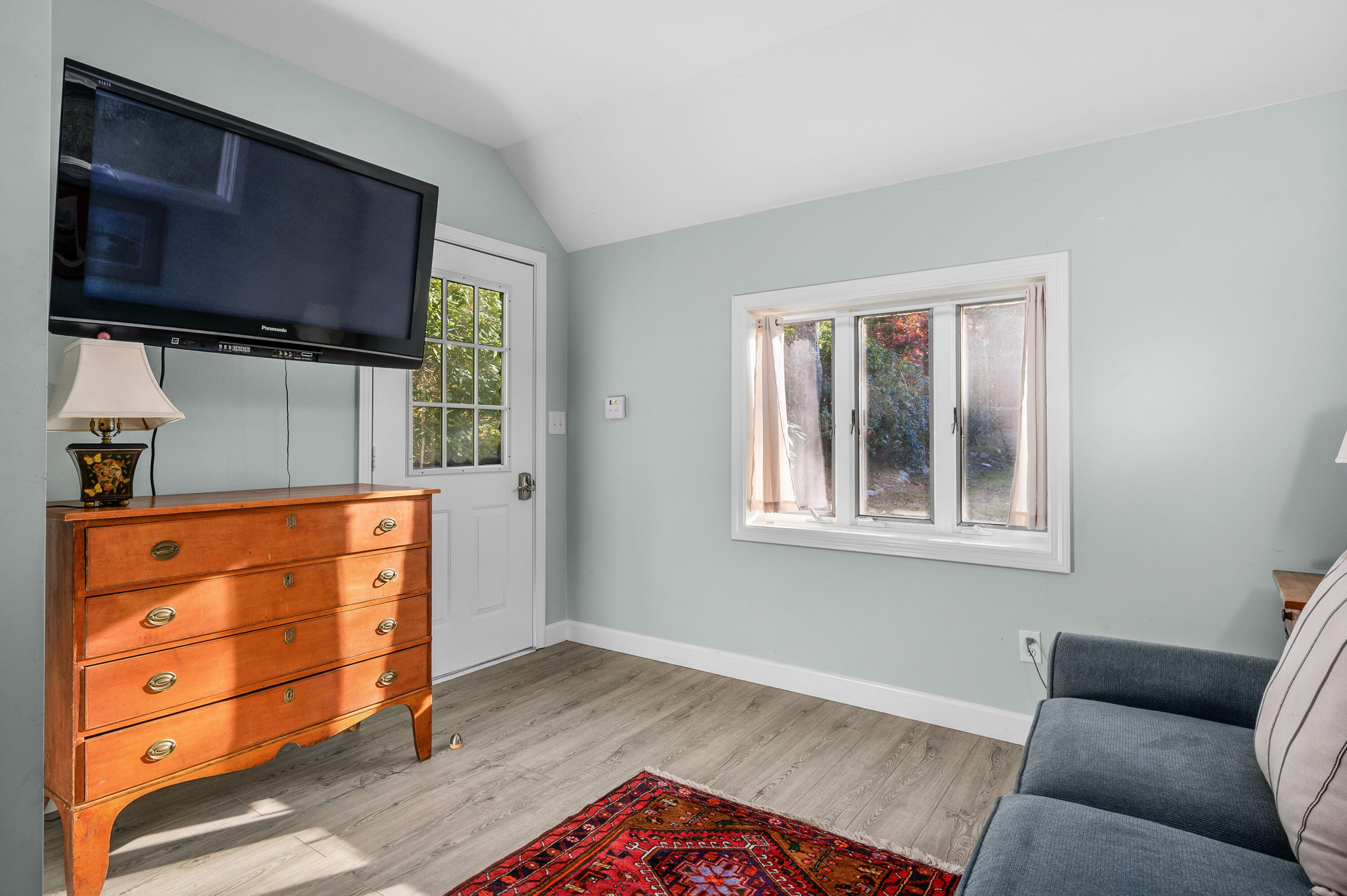 523 Bumps River Road Osterville, MA 02655 - Photo 41 of 49 a living room with furniture and a flat screen tv