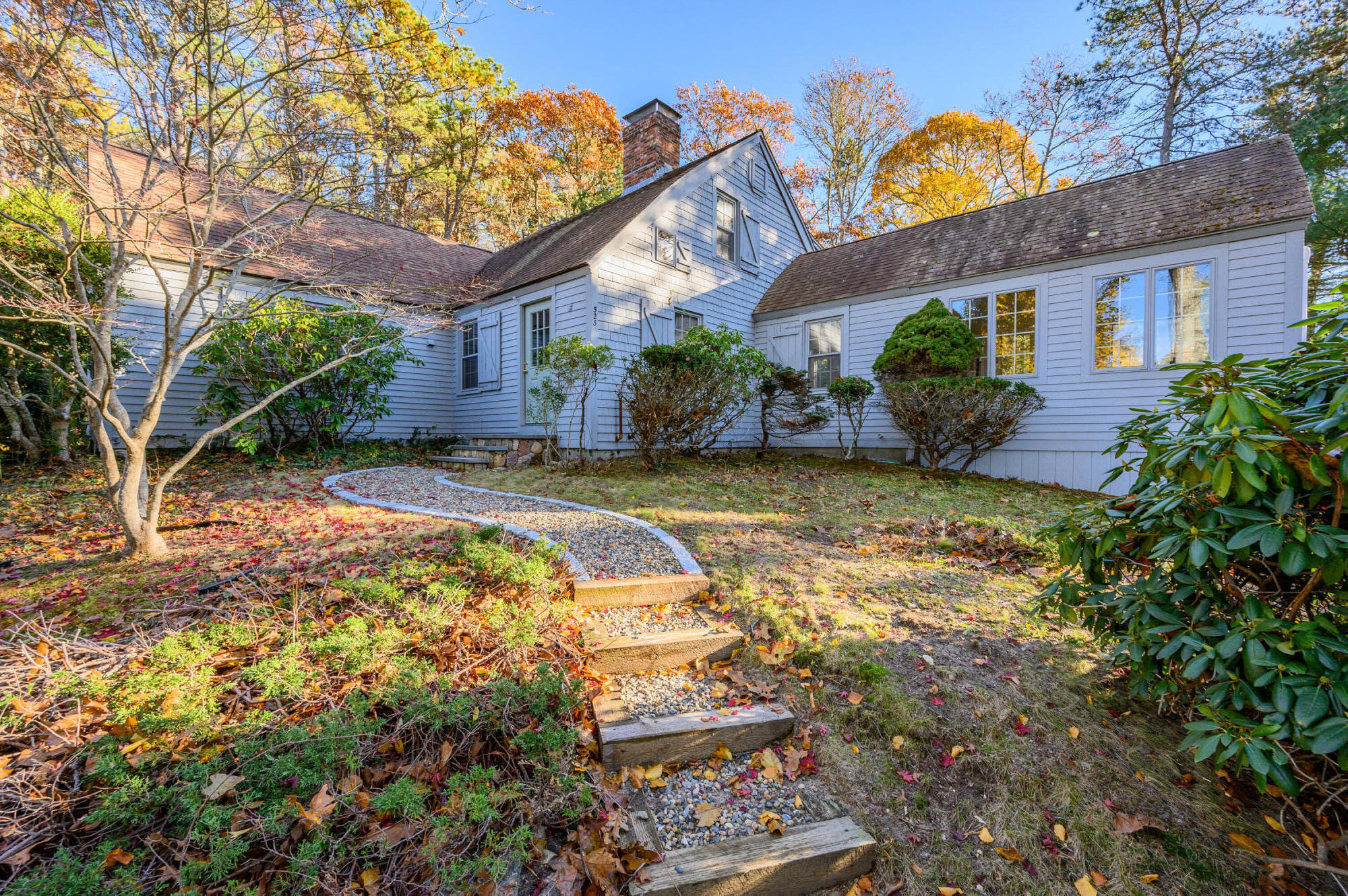 523 Bumps River Road Osterville, MA 02655 - Photo 5 of 49 a view of a house with a yard garage and sitting area