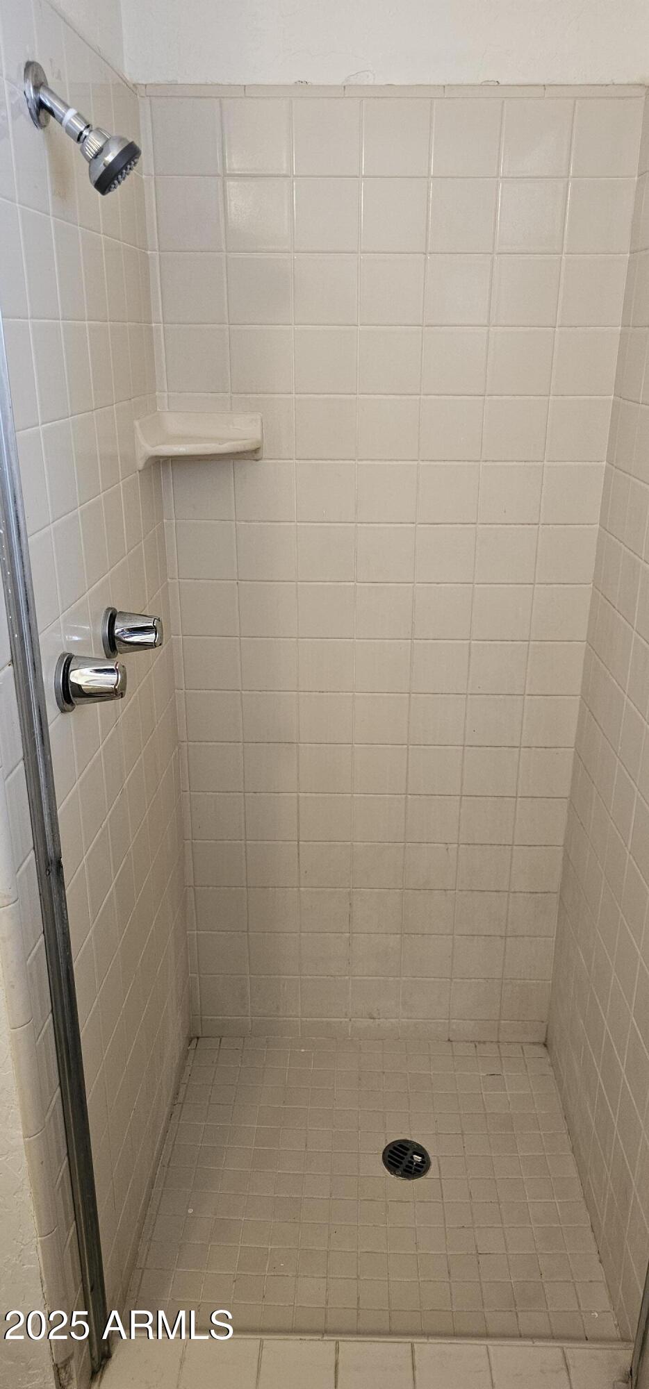 62 South Allen, Unit A Mesa, AZ 85204 - Photo 15 of 15 a bathroom with a shower