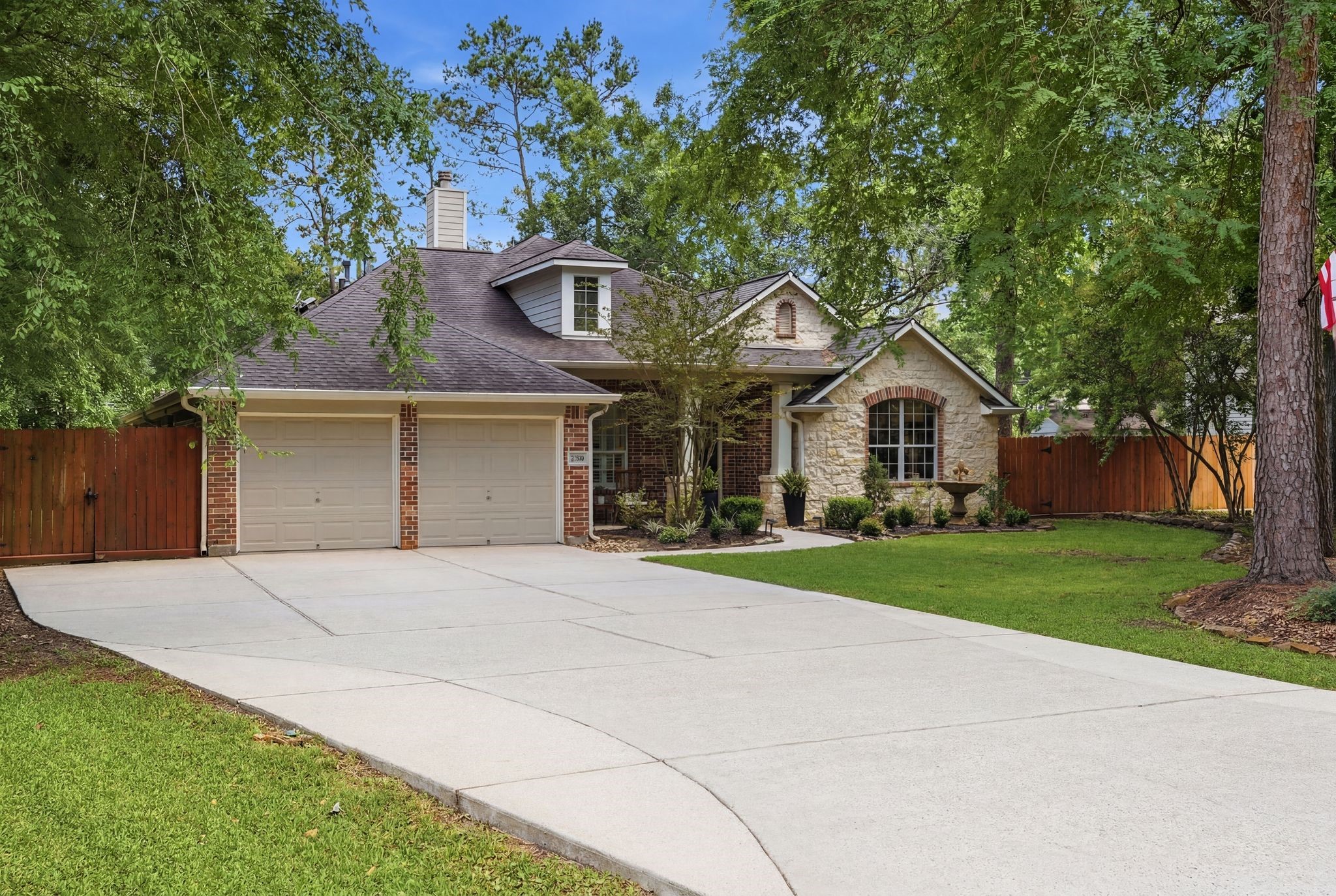 2408 Hollowbrook Lane Conroe, TX 77384 - Photo 42 of 49 Long drive way with added concrete for extra parking