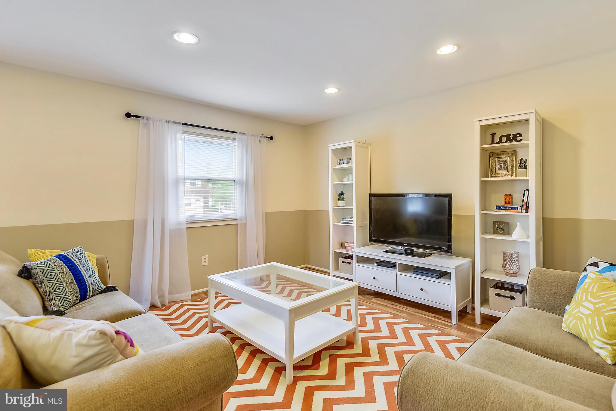 9935 Mallard Drive Laurel, MD 20708 - Photo 23 of 40 Living Room w/Luxury Laminated Wood Floors