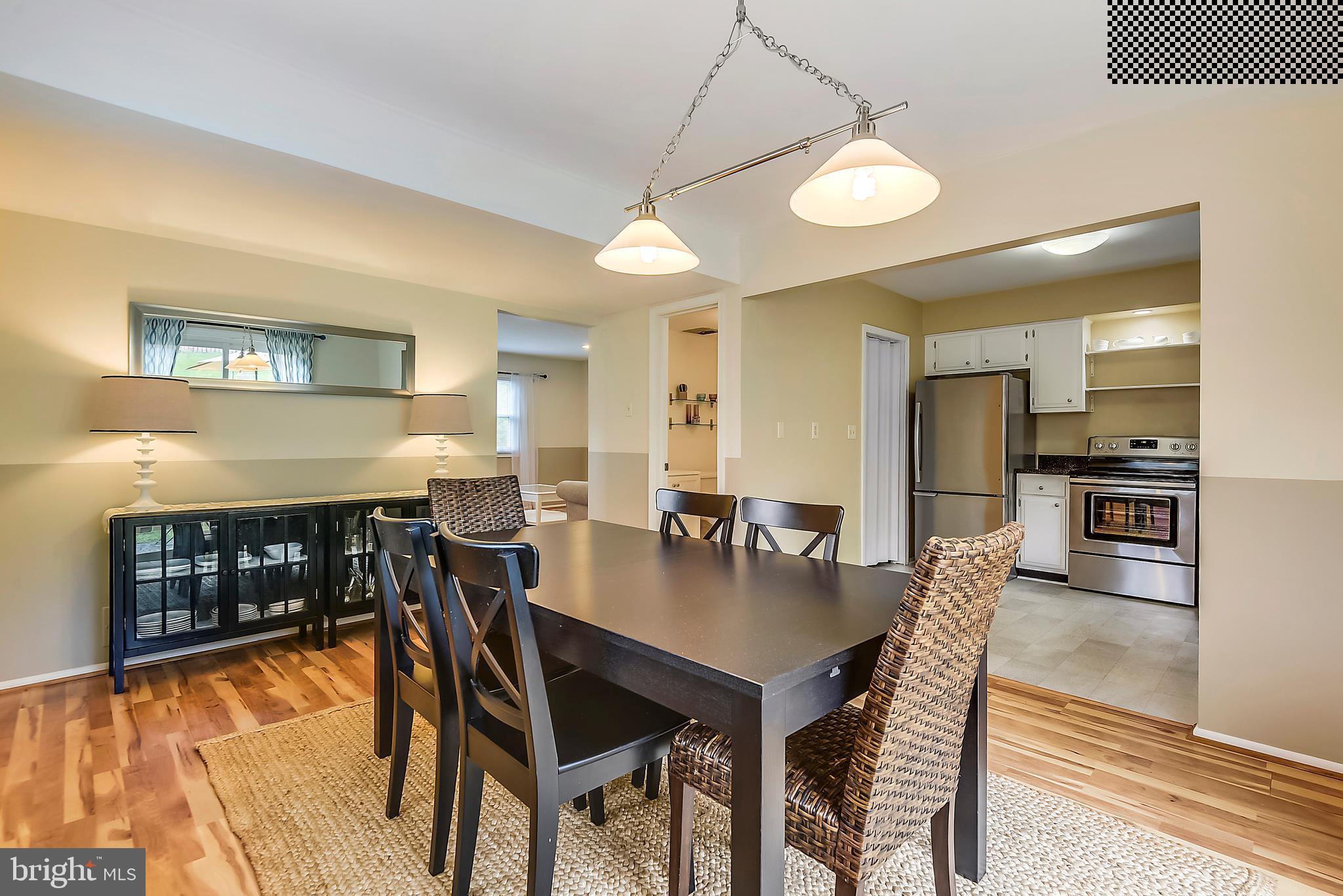9935 Mallard Drive Laurel, MD 20708 - Photo 27 of 40 15 x 11 Dining Room w'Luxury Laminated Wood Floors