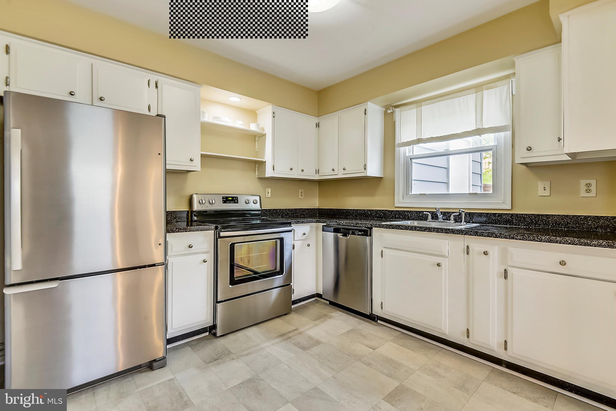 9935 Mallard Drive Laurel, MD 20708 - Photo 5 of 40 Updated Kitchen w/Stainless Steel Appliances