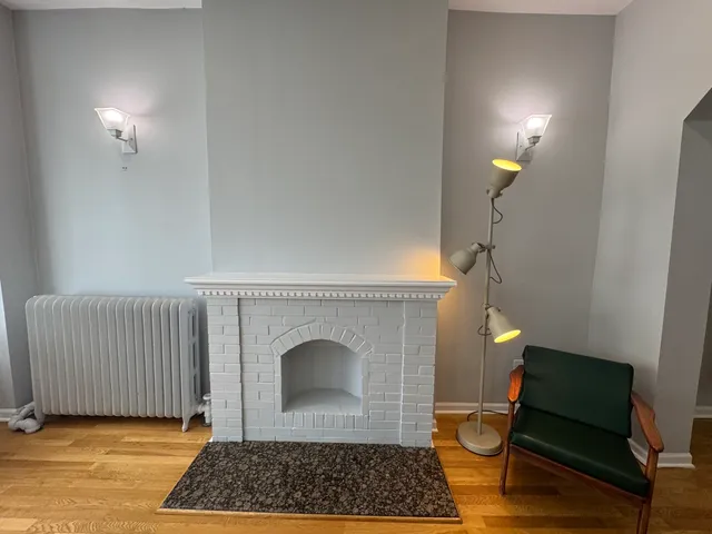 a room with furniture and a fireplace