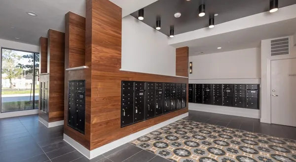 a bathroom with a glass shower door