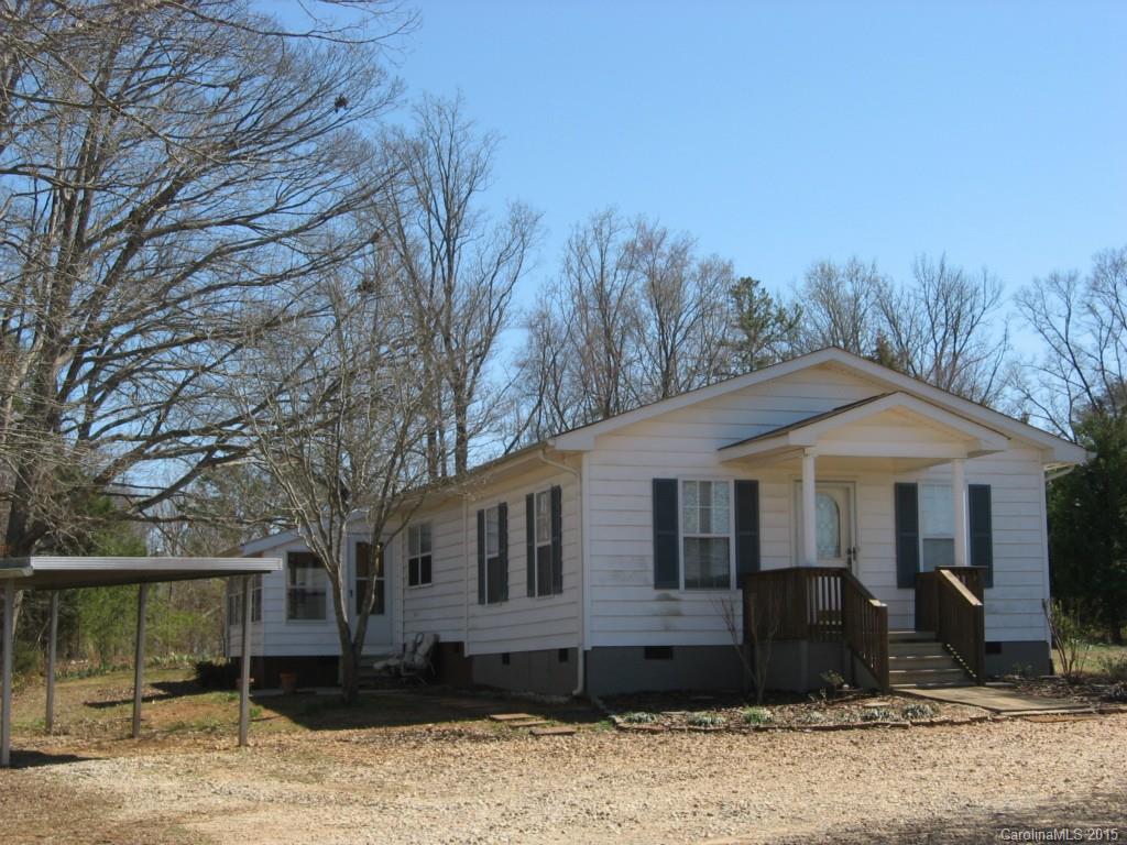 1065 Turkey Creek Ridge Road York, SC 29745 - Photo 1 of 4 a front view of a house with a yard