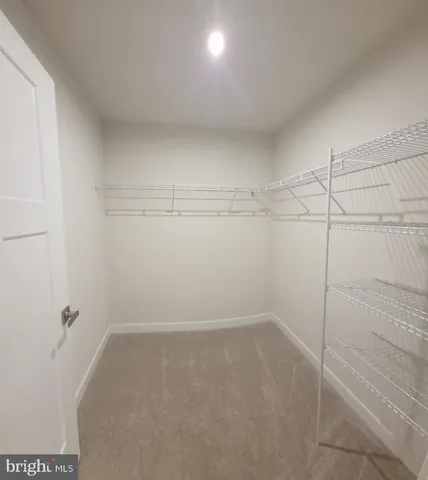 a view of a room with racks on the wall