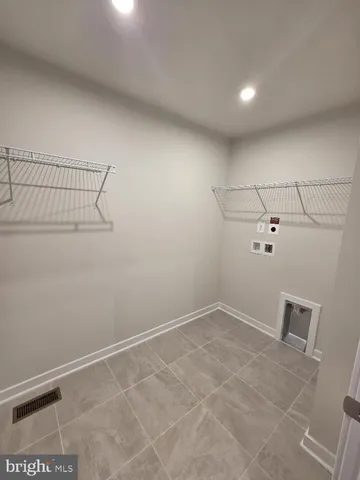 a view of a room with racks on the wall