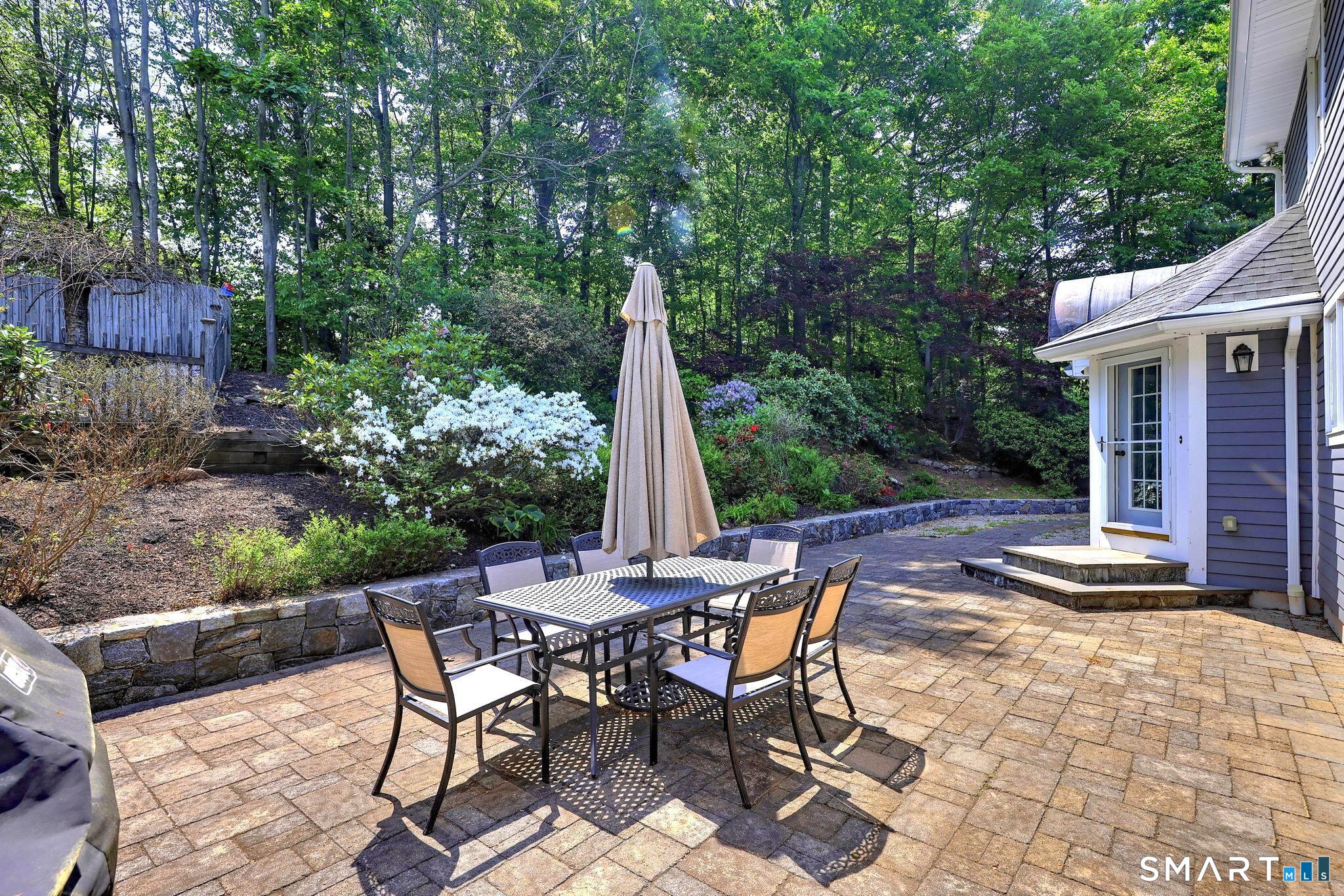 60 West Meadow Road Hamden, CT 06518 - Photo 11 of 35 Step outside to the patio, steps from the kitchen and the stairs leading up to the in pool.