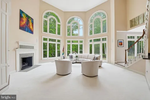 a kitchen with stainless steel appliances granite countertop wooden cabinets a stove top oven a sink and dishwasher