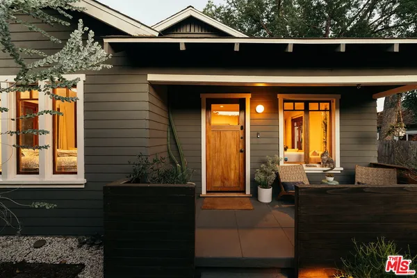 a front view of a house with a porch
