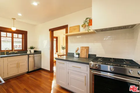 a view of living room with furniture and floor to ceiling window