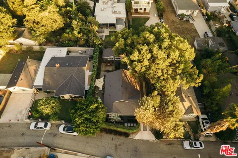 an aerial view of residential house with parking space