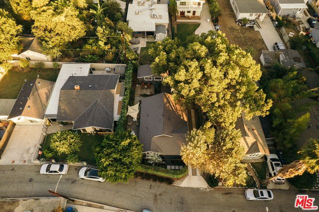 an aerial view of residential house with parking space