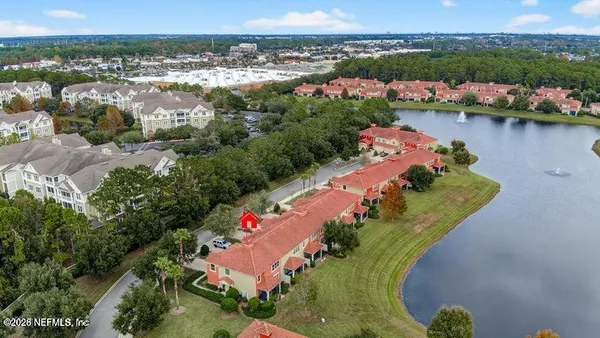 an aerial view of lake residential house with outdoor space