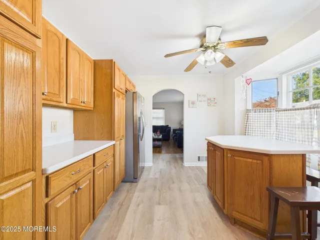a view of a kitchen from the hallway