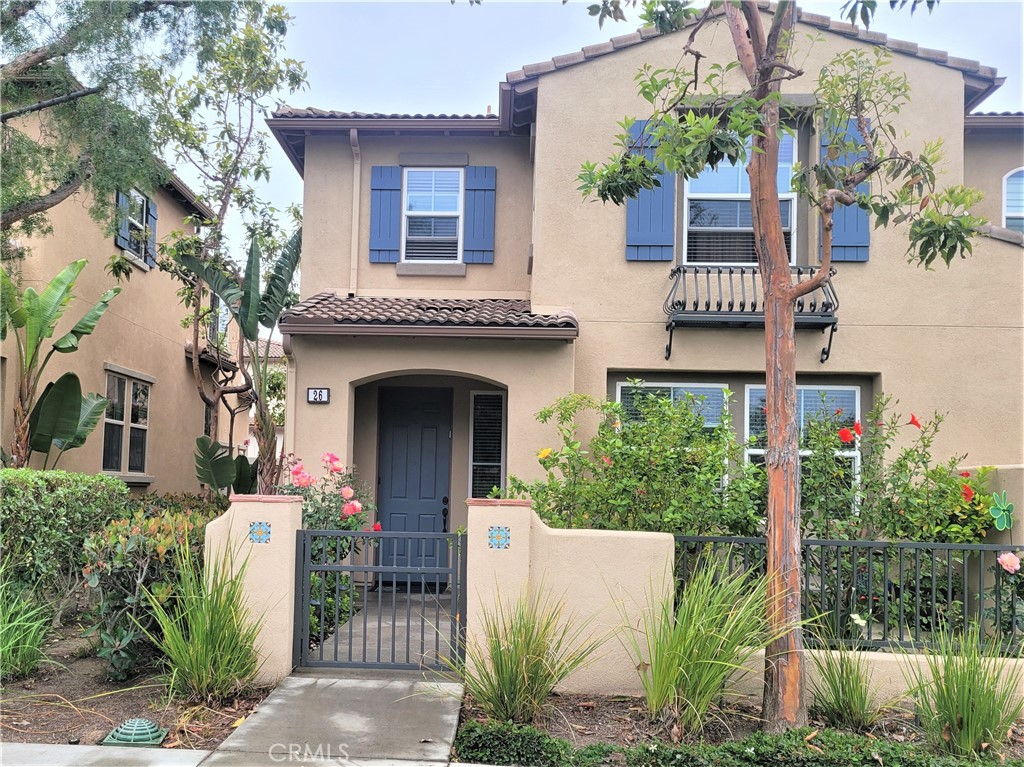 26 Opus Irvine, CA 92618 - Photo 1 of 32 front view of a house with potted plants