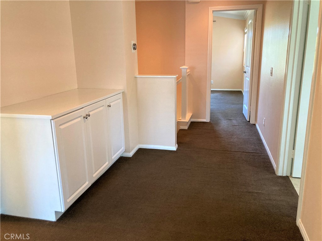 26 Opus Irvine, CA 92618 - Photo 22 of 32 a view of a hallway with hallway