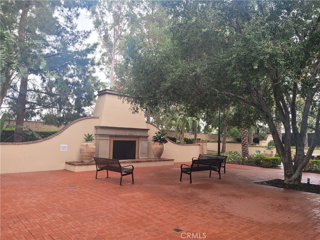26 Opus Irvine, CA 92618 - Photo 27 of 32 a view of a house with a couches and a tree