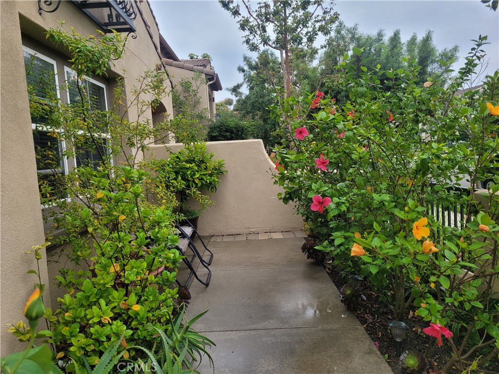26 Opus Irvine, CA 92618 - Photo 3 of 32 an aerial view of a house with a yard and garden