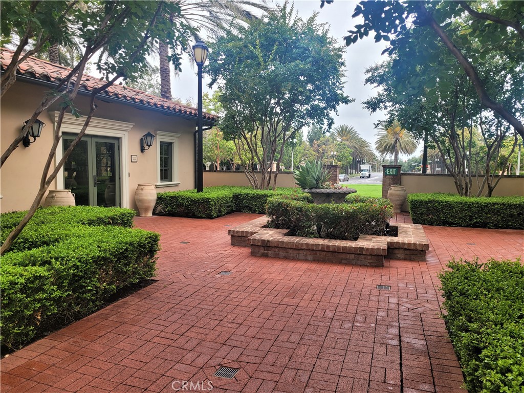 26 Opus Irvine, CA 92618 - Photo 32 of 32 a view of a patio with chair and tables
