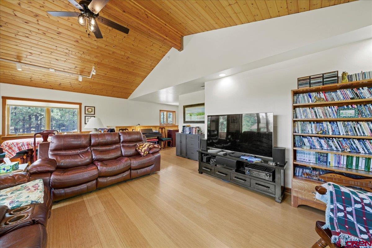 66 Blue Stem Ridgway, CO 81432 - Photo 2 of 19 a living room with furniture and a flat screen tv