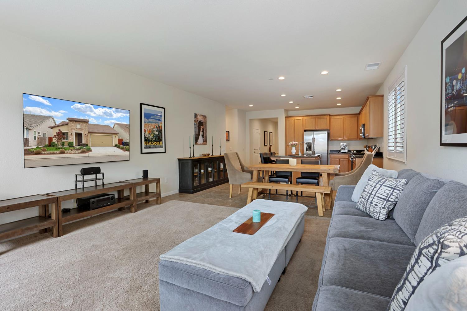 3828 Lookout Drive Modesto, CA 95355 - Photo 12 of 39 a living room with furniture kitchen view and a flat screen tv