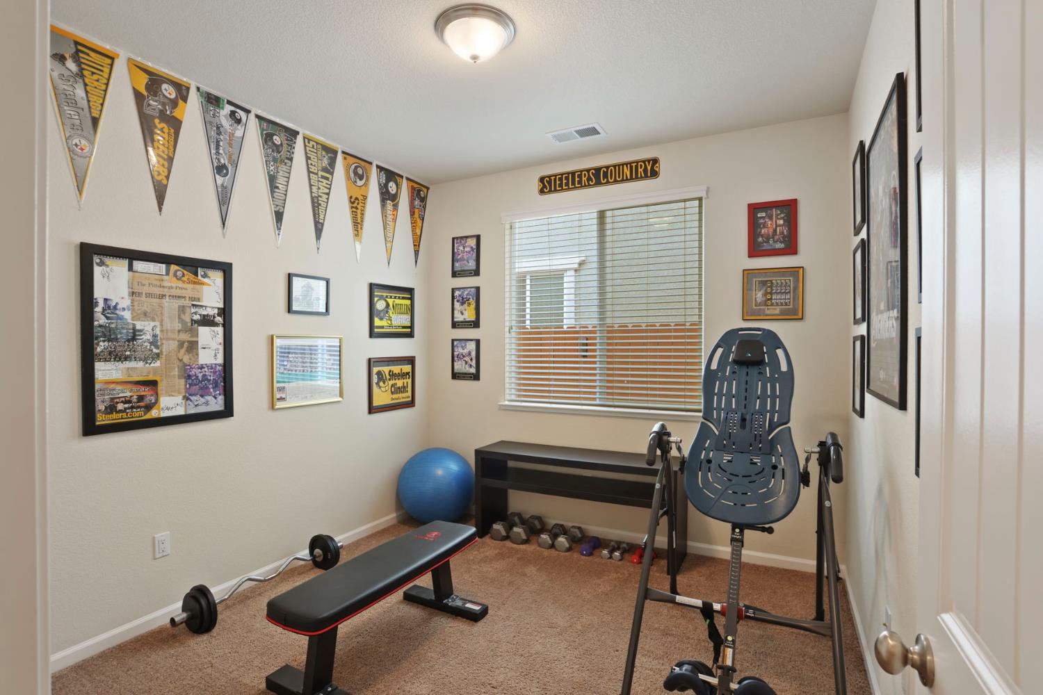 3828 Lookout Drive Modesto, CA 95355 - Photo 17 of 39 a view of a workspace with furniture and a window