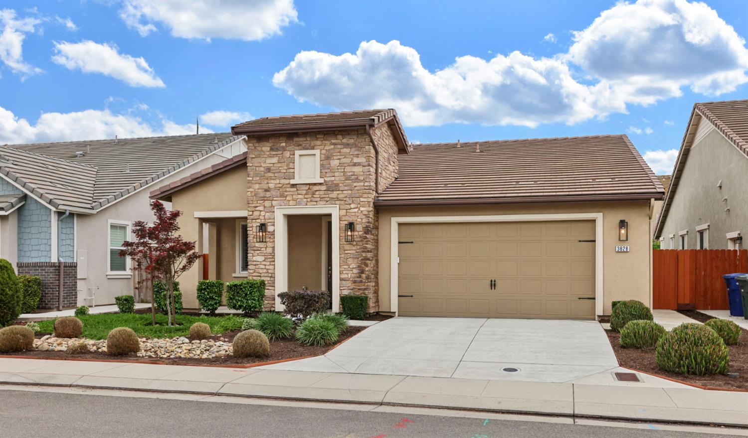 3828 Lookout Drive Modesto, CA 95355 - Photo 25 of 39 front view of a house with a yard