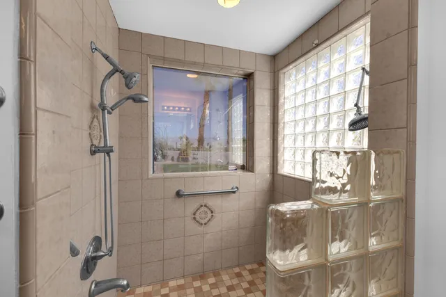 a kitchen with stainless steel appliances a sink stove and refrigerator