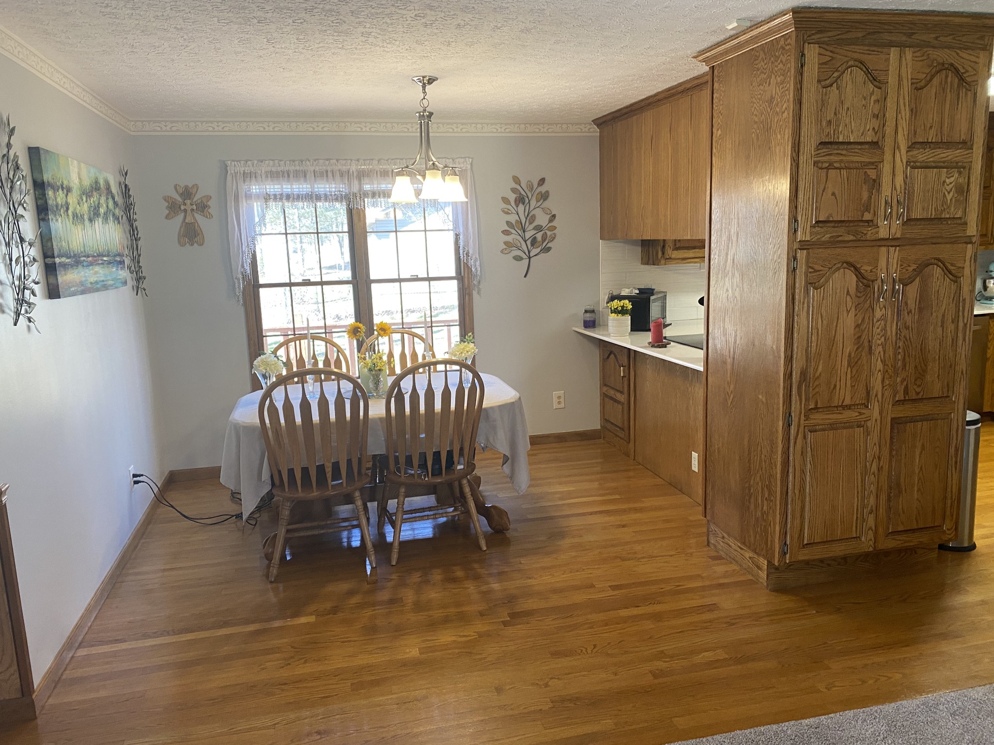 4583 Mt View Road Manchester, TN 37355 - Photo 8 of 18 a kitchen with stainless steel appliances granite countertop a refrigerator a sink a stove and a wooden floors