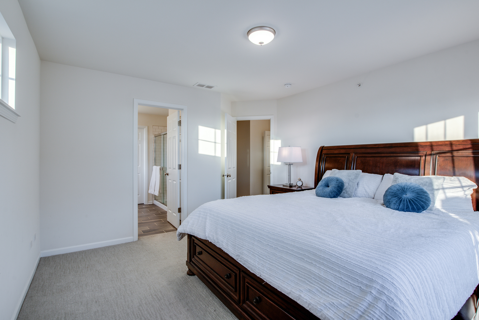 4477 Monroe Court Naperville, IL 60564 - Photo 14 of 23 a bedroom with a bed and closet
