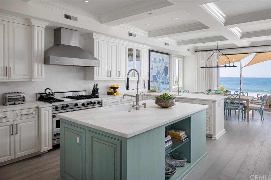 35271 Beach Road Dana Point, CA 92624 - Photo 17 of 61 a kitchen with a sink a stove and cabinets