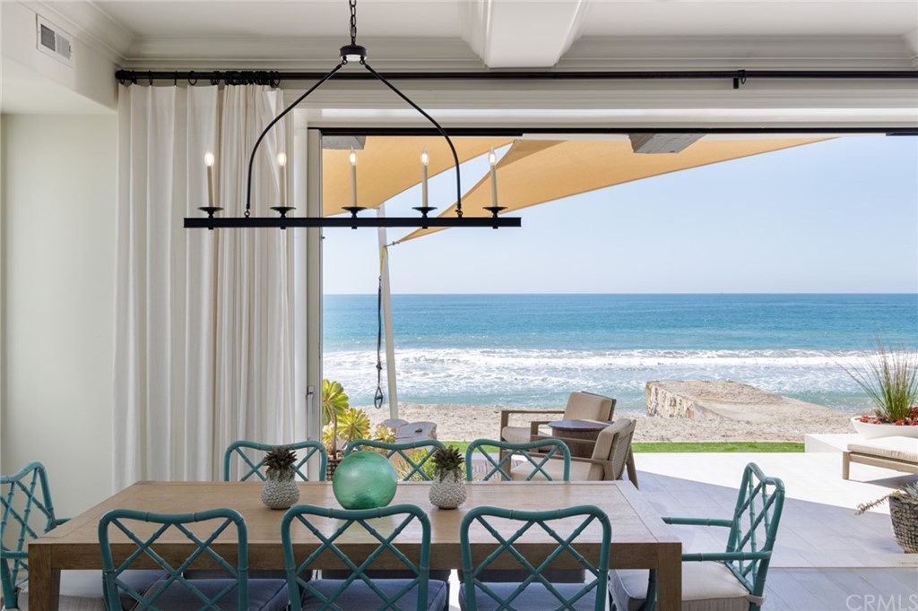 35271 Beach Road Dana Point, CA 92624 - Photo 18 of 61 a view of a dining room with furniture window and outside view
