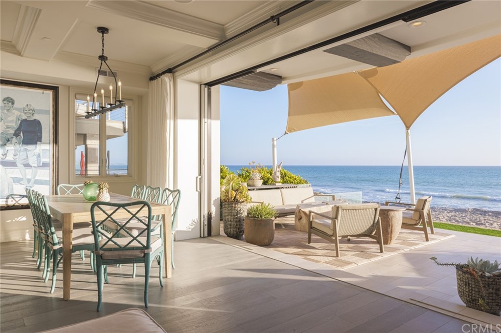 35271 Beach Road Dana Point, CA 92624 - Photo 19 of 61 a patio with a table and chairs